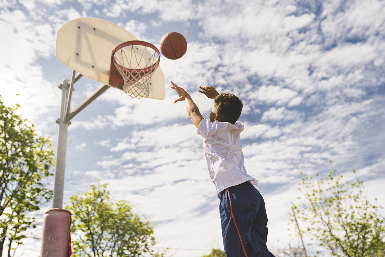 Kid Playing Basketball